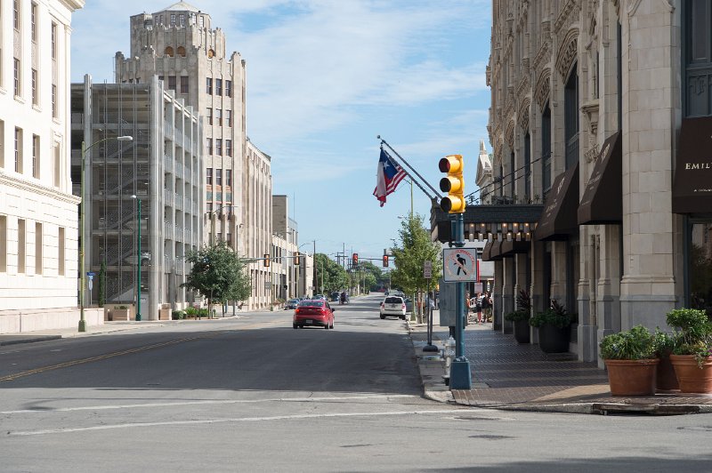 20151031_114606 D4S.jpg - The San Antonio Express Building (with flags) and Emily Morgan Building on right